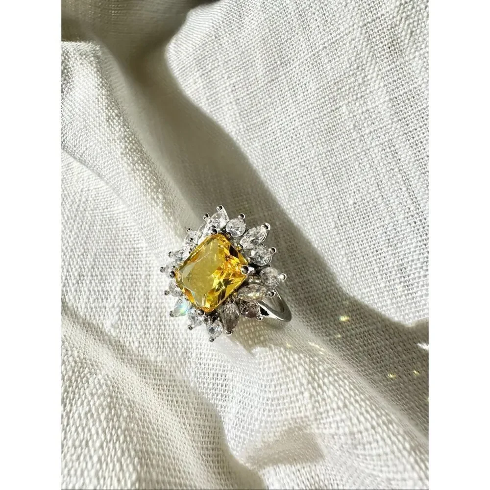 Yellow elongated radiant cut canary cubic zirconia cocktail ring